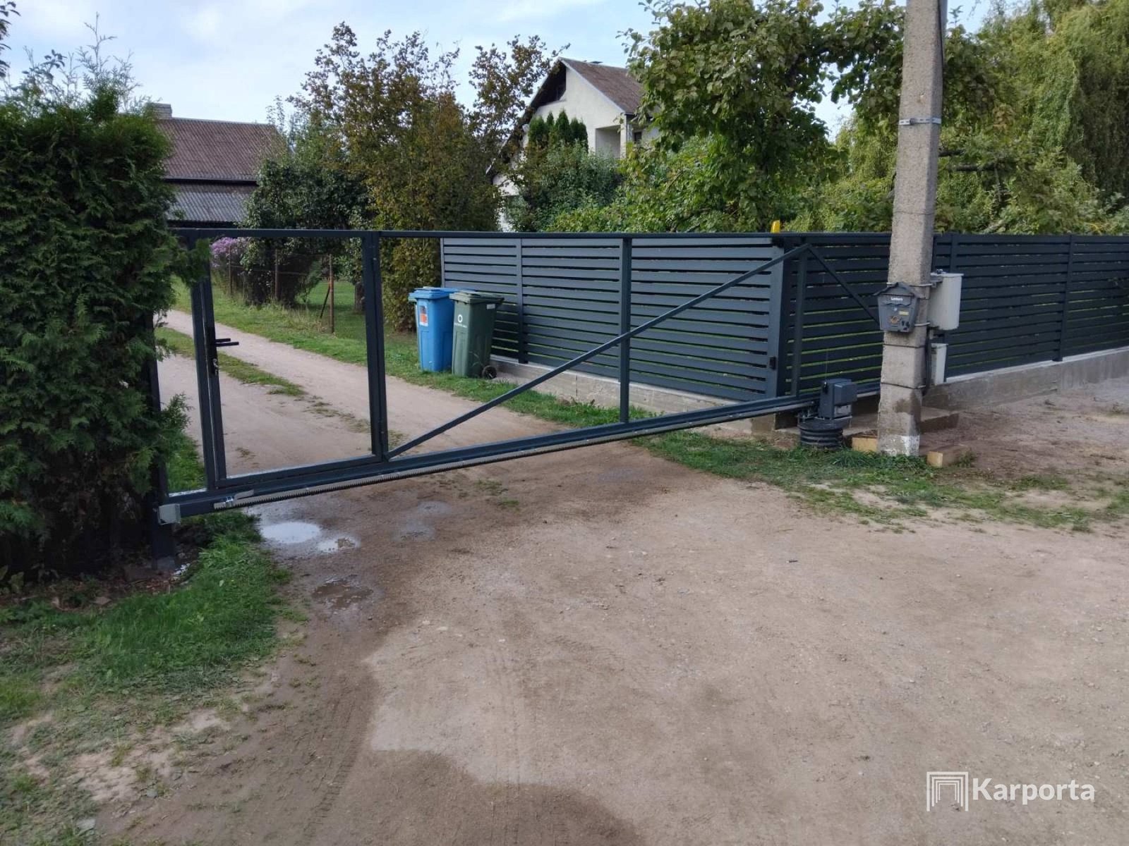 Karporta įrengti kiemo vartai