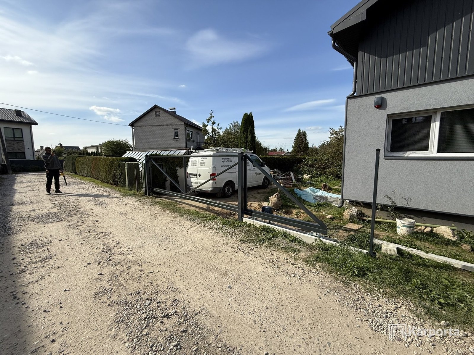 Karporta įrengti kiemo vartai